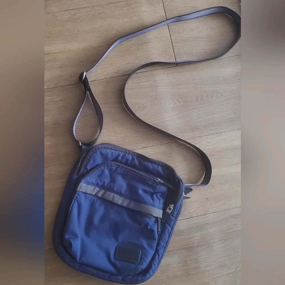 TUMI Navy Blue Organizer Travel Crossbody Bag.